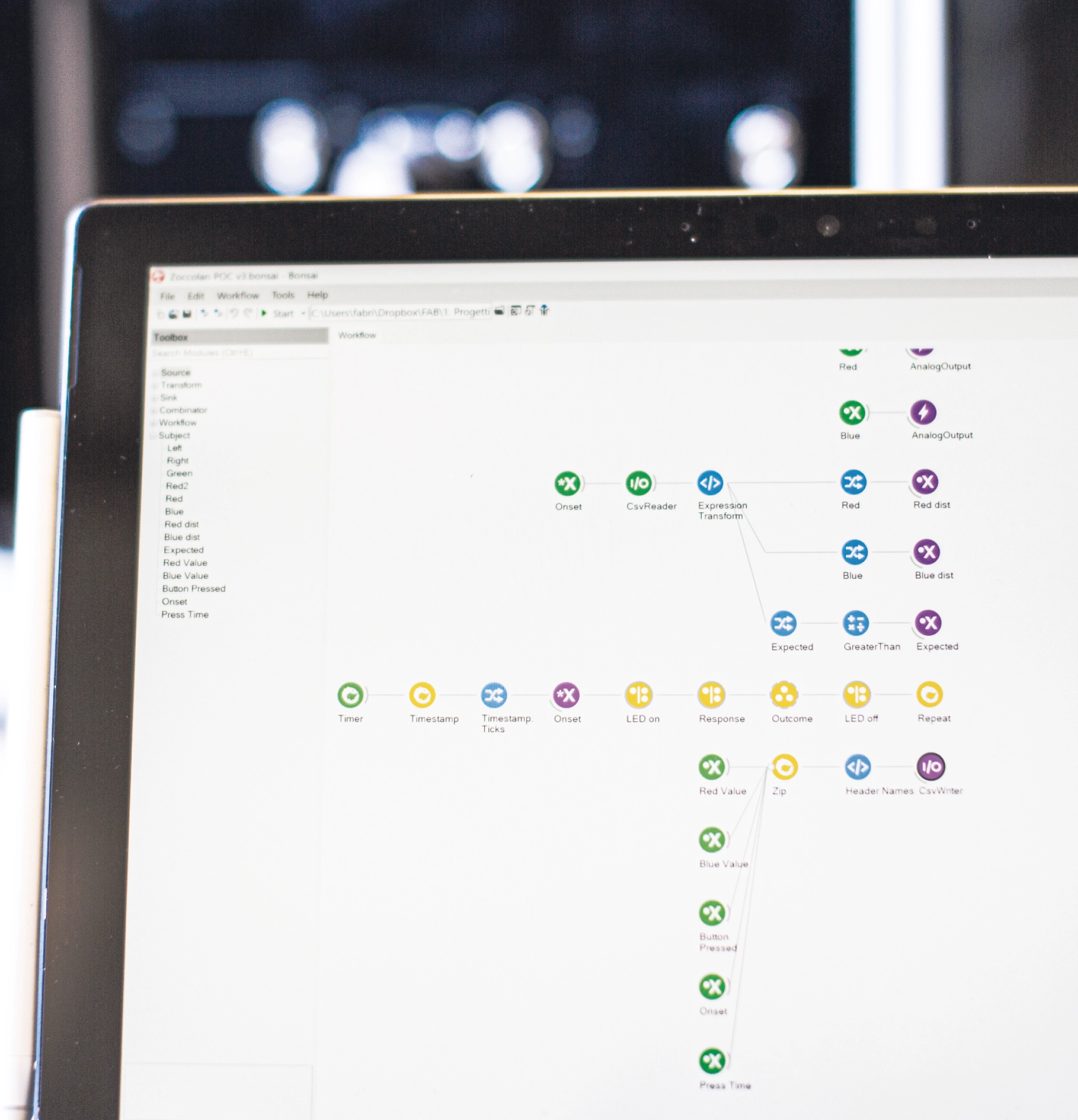 Researcher assembling Flex-I with plug-and-play components